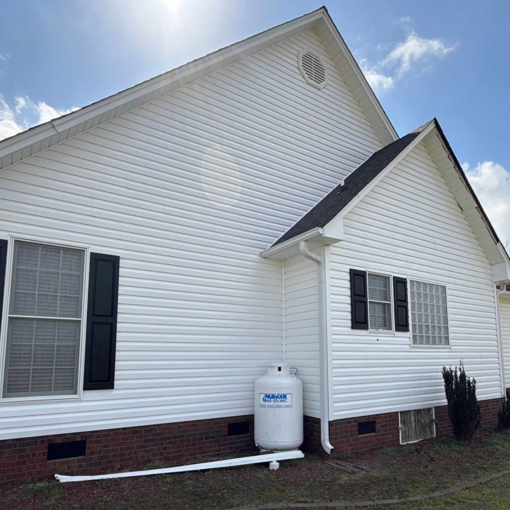 Gutter siding and garage door oxidation removal project in Cary NC